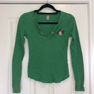 Green long-sleeve Free People with Orange detailing and Robin embroidery. Size M